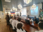 Сотрудник следственного управления принял участие в проведении открытого урока, приуроченного ко Дню воссоединения ДНР, ЛНР, Запорожской и Херсонской областей с Россией